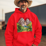 Man wearing a red hoodie with a graphic design, standing outdoors.