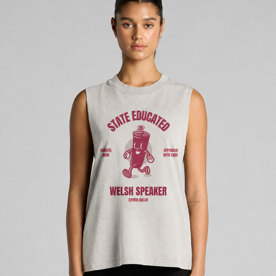 Person wearing a sleeveless shirt with red text and graphics on a gray background