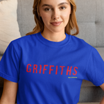 Person wearing a blue t-shirt with 'GRIFFITHS' printed in red.