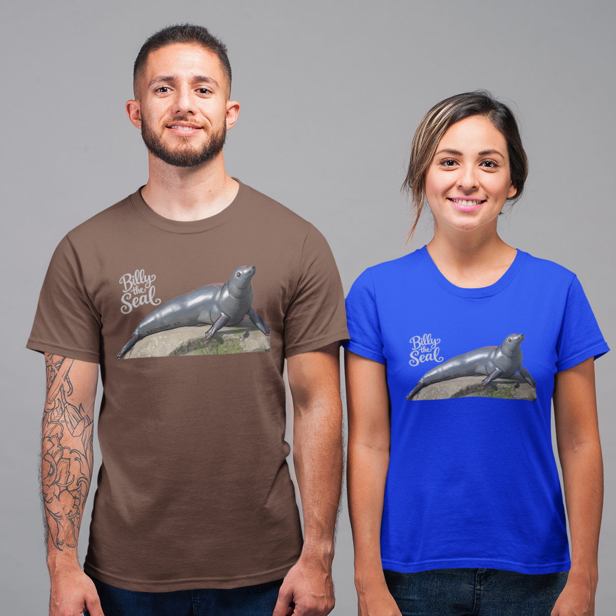 Two people wearing t-shirts with a graphic of a seal and text on a gray background