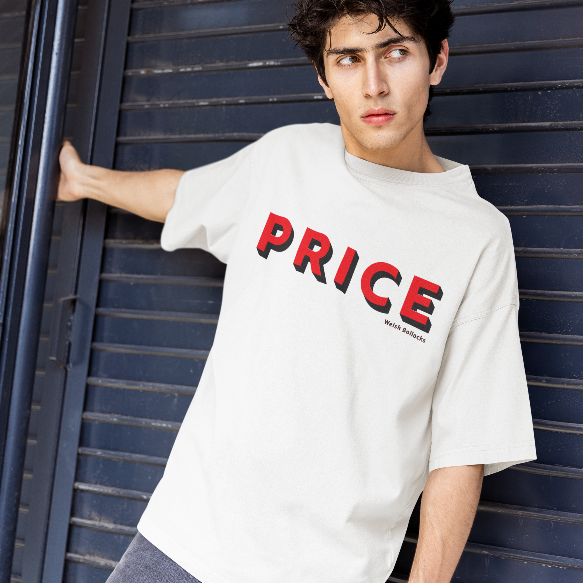 Person wearing a white t-shirt with 'PRICE' printed in red letters against a blue background