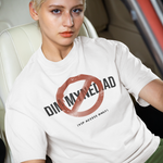 Person wearing a white sweatshirt with a red circle and line design, sitting inside a car.