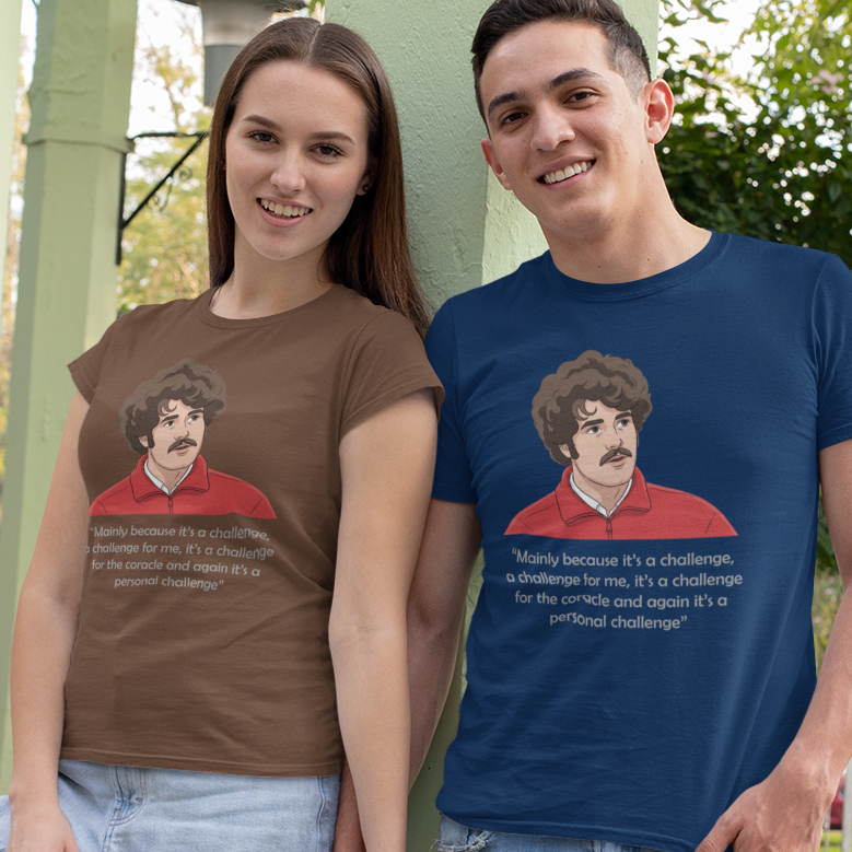 Two models standing outdoors in a park-like setting wearing custom graphic t-shirts. The woman on the left wears a brown t-shirt, and the man on the right wears a navy blue t-shirt.
